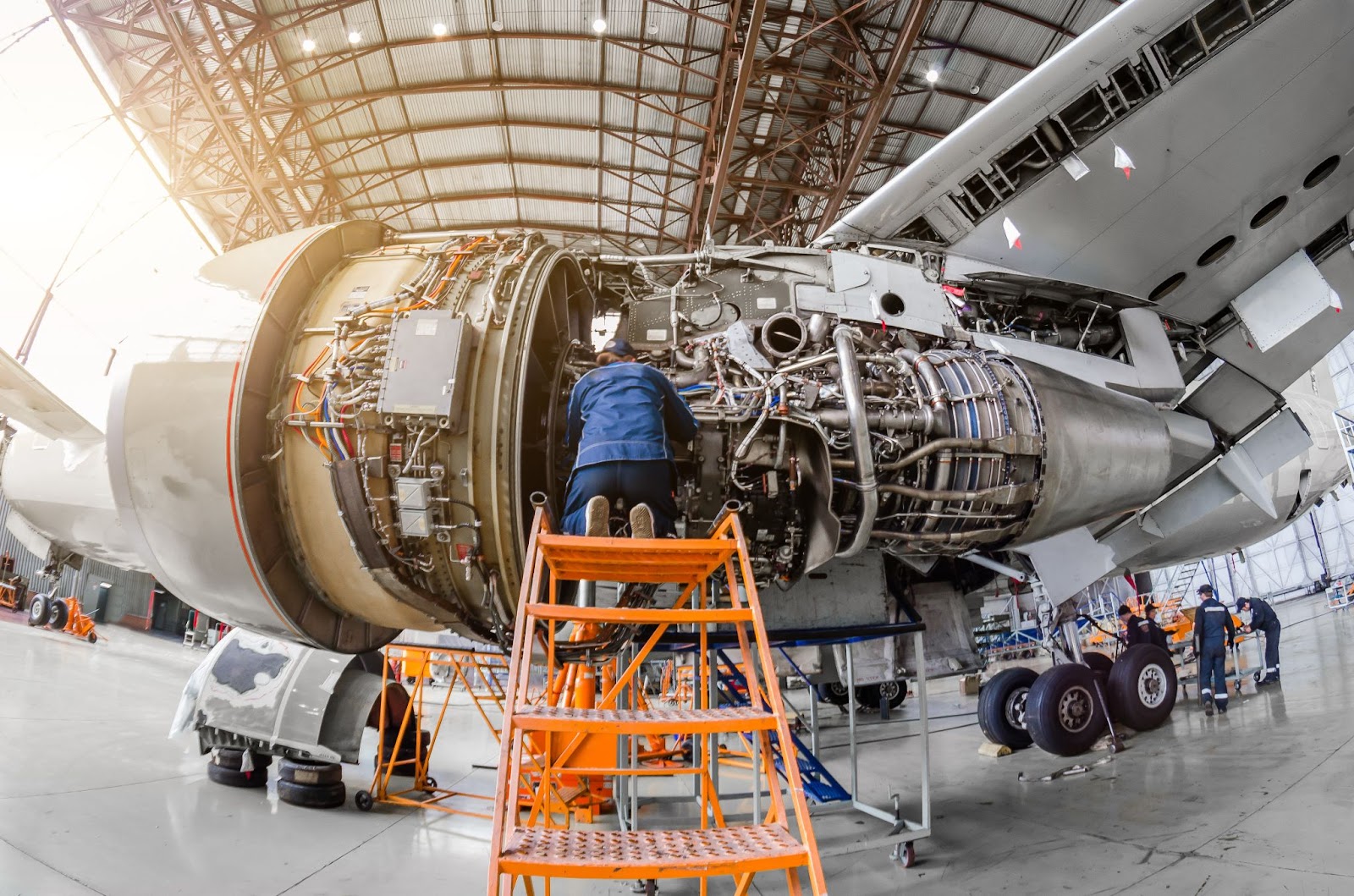 An airplane engine being worked on
