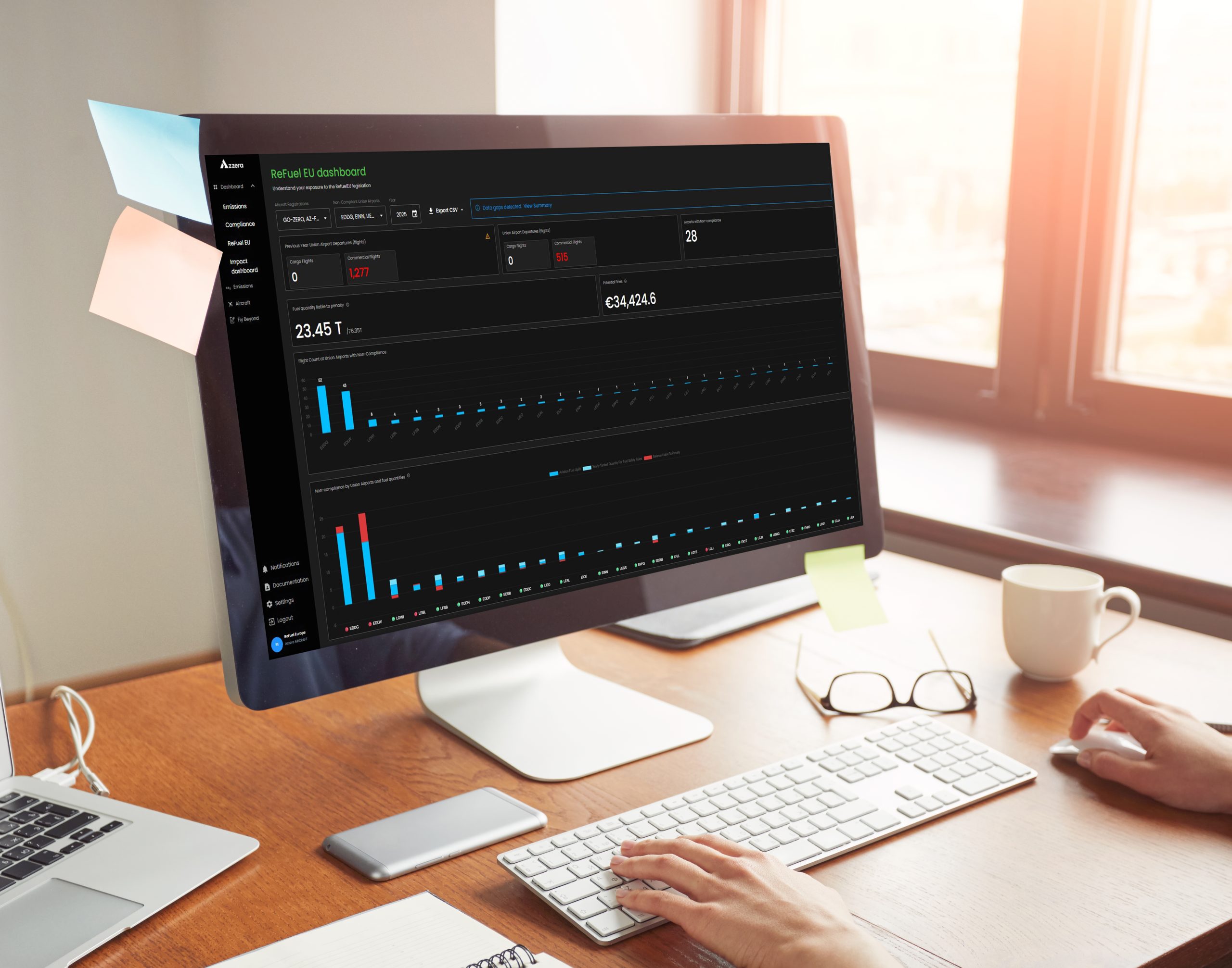 Office worker using net-book with CELESTE from Azzera on-screen
